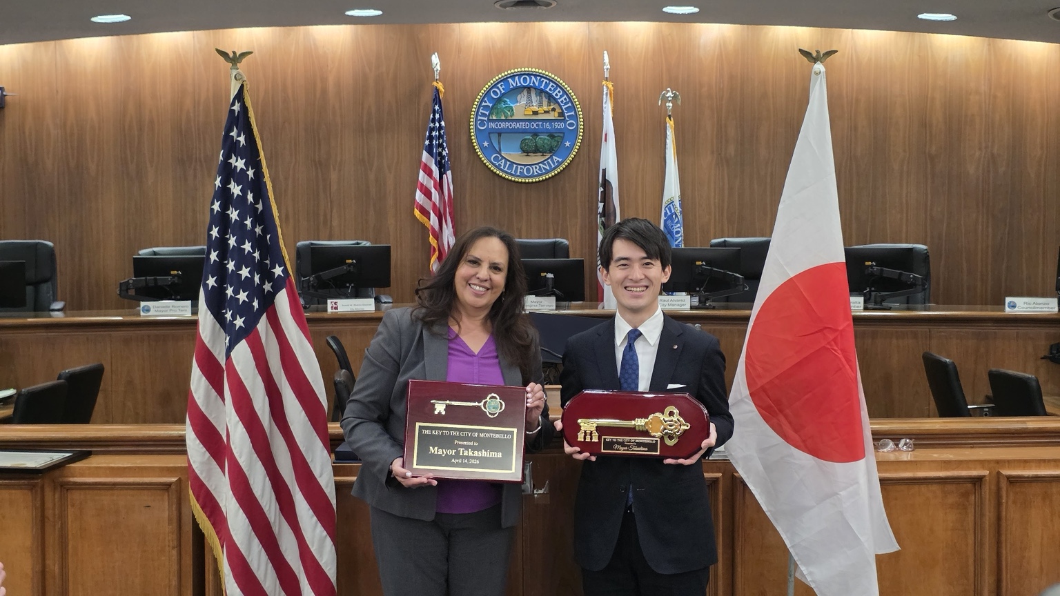 Montebello and Ashiya representatives presenting ceremonial city keys
